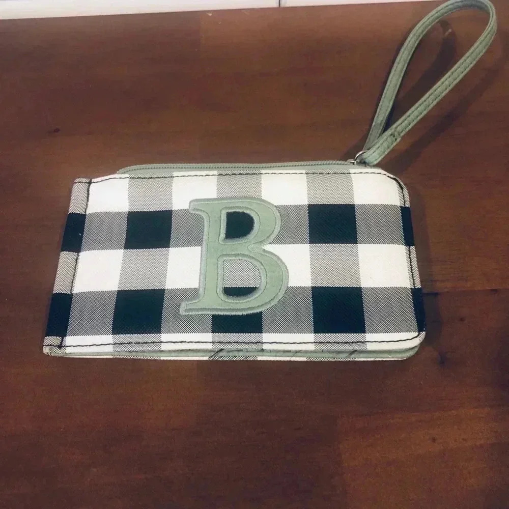 Black and white checkered wallet with a b on front